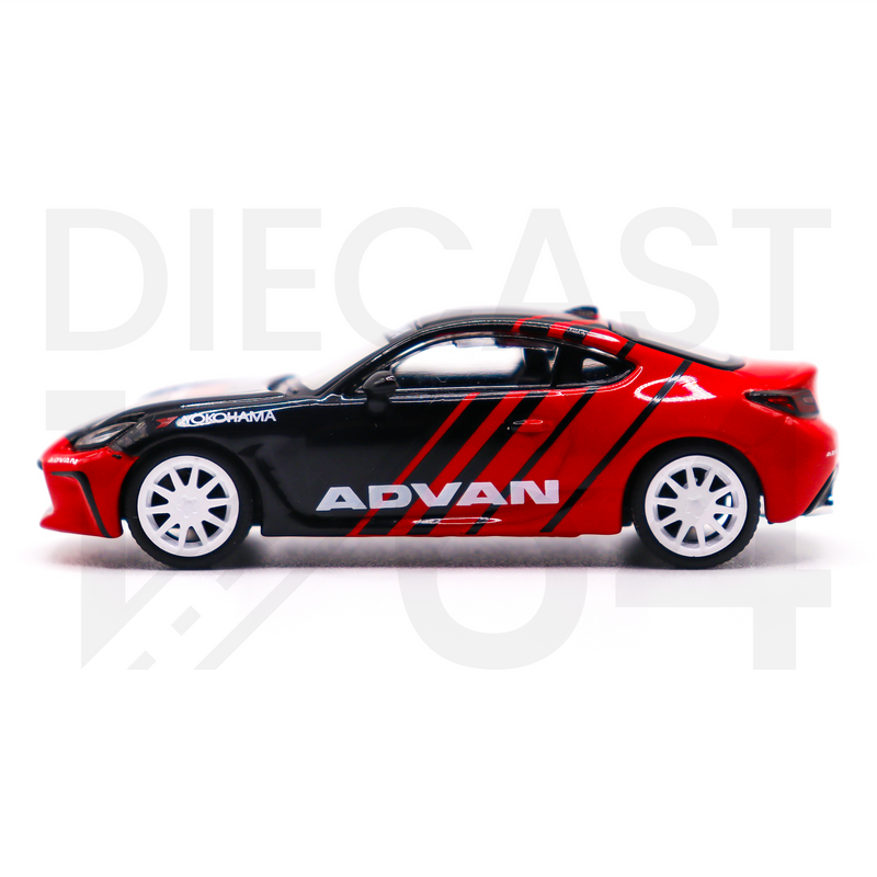 Pop Race Toyota GR86 with Advan Livery driver side door and white wheels