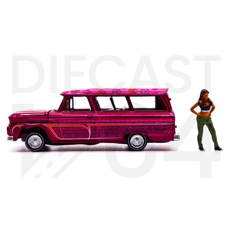 Auto World x American Diorama 1:64 1957 Chevrolet Suburban Lowrider With Figure Limited 3,600 Pieces – Pink – Mijo Exclusives CP8021 driver side and figurine